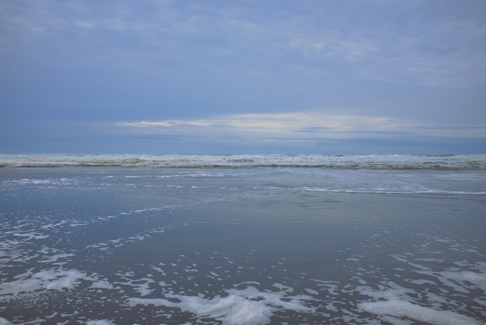 The beach, with the Pacific Ocean